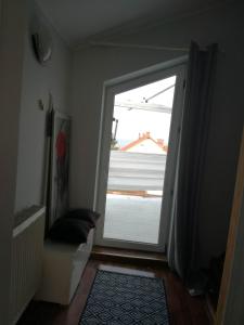 Posteľ alebo postele v izbe v ubytovaní niezależne piętro w domu z widokiem na morze