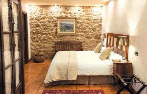 Postel nebo postele na pokoji v ubytování Posada Mayor de Migueloa + 37 fotografií