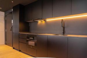 A kitchen or kitchenette at Valencia Luxury - Sea Port II