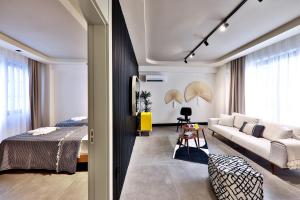 Luff Suites客房内的一张或多张床位