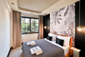 Luff Suites客房内的一张或多张床位