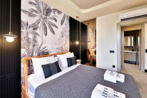 Luff Suites客房内的一张或多张床位