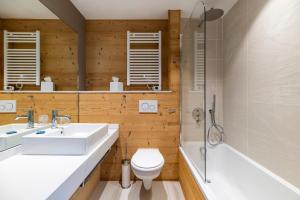 Koupelna v ubytování Le Chalet Blanc Hôtel & Spa