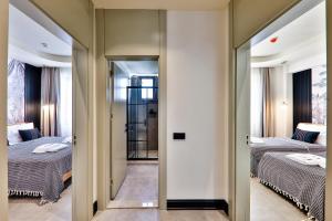 Luff Suites客房内的一张或多张床位