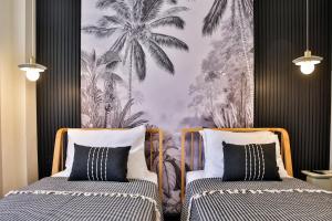 Luff Suites客房内的一张或多张床位