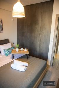 Postel nebo postele na pokoji v ubytování La Vita Villas
