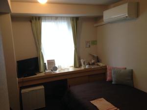 TV a/nebo společenská místnost v ubytování Nagano Plaza Hotel