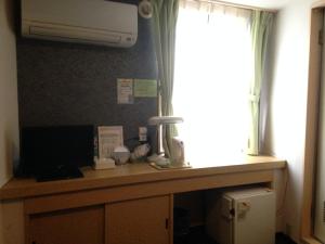Kuchyň nebo kuchyňský kout v ubytování Nagano Plaza Hotel