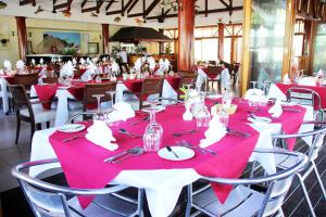 A restaurant or other place to eat at Pirogue Lodge