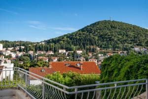 a view of a town with a mountain at Teranino Apartment in Dubrovnik