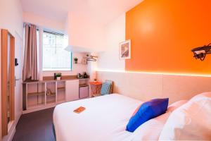 MAISON FRANCOIS Paris - Two rooms apartment or Studio - Linkable together tesisinde bir odada yatak veya yataklar