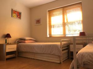 Ένα ή περισσότερα κρεβάτια σε δωμάτιο στο Pigeon Brae pet friendly accommodation Enniskillen