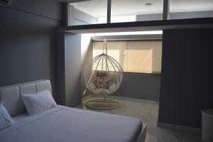 מיטה או מיטות בחדר ב-Blue Breeze