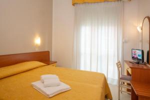Katil atau katil-katil dalam bilik di Hotel Carnaby