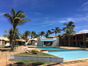 Bazén v ubytování Chalé em frente à Praia nebo v jeho okolí
