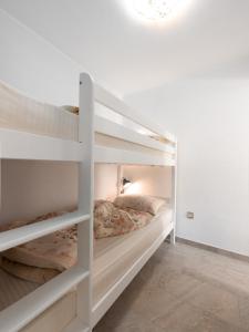 Krevet ili kreveti na kat u jedinici u objektu Ferienhaus Baraka - Medveja