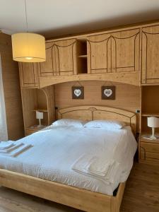 Un pat sau paturi într-o cameră la B&B La Ceresara