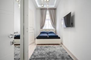 Posteľ alebo postele v izbe v ubytovaní Király 35 Luxury Apartment