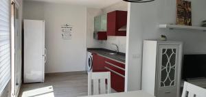 Kuchyň nebo kuchyňský kout v ubytování CALA HOUSE II Luminoso adosado con vistas,piscina comunitaria y parking incluido