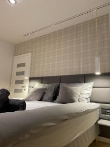 Posteľ alebo postele v izbe v ubytovaní Apartament Opieszyn 16