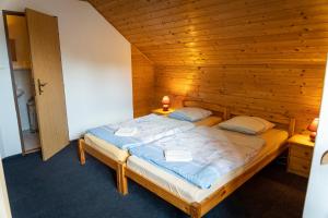 Hotel Zdobnice tesisinde bir odada yatak veya yataklar