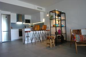 Cuisine ou kitchenette dans l'établissement Blue Sunset - Apartamento Valentina