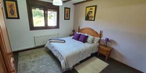 Postel nebo postele na pokoji v ubytování Vivienda María Lourdes