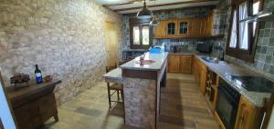 Kuchyň nebo kuchyňský kout v ubytování Vivienda María Lourdes