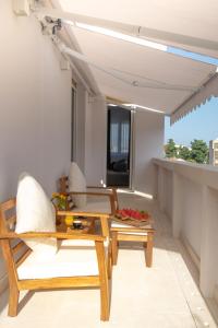 a living room with a table and chairs at Luxury apartment Mirage Split in Split