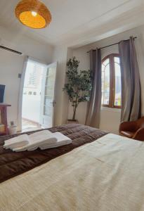 Cama o camas de una habitación en Hotel De Blasis & Cowork