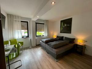 Postel nebo postele na pokoji v ubytování Hotel Hegemann garni
