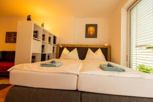 Posteľ alebo postele v izbe v ubytovaní Appartements in Graz beim LKH
