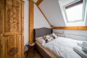 Postel nebo postele na pokoji v ubytování Dwa Stawy