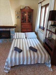 Ένα ή περισσότερα κρεβάτια σε δωμάτιο στο Villa Cayetana