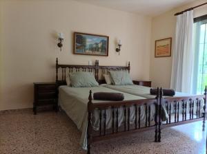 Ένα ή περισσότερα κρεβάτια σε δωμάτιο στο Villa Cayetana +33 φωτογραφίες