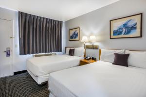 Ένα ή περισσότερα κρεβάτια σε δωμάτιο στο Knights Inn and Suites Yuma
