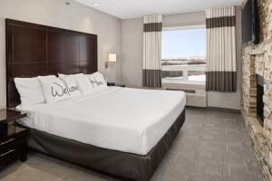 Postel nebo postele na pokoji v ubytování Home Inn & Suites - Swift Current