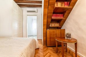 Posteľ alebo postele v izbe v ubytovaní Casanova Fenice - Canal View