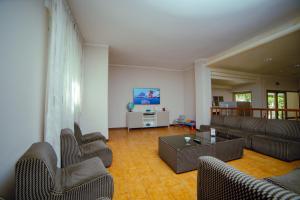 TV a/nebo společenská místnost v ubytování Hotel 21 Riccione
