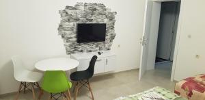 TV a/nebo společenská místnost v ubytování Antonio Apartments