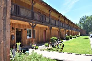 a bike parked in front of a building at Methow River Lodge in Winthrop