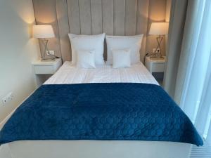 Łóżko lub łóżka w pokoju w obiekcie Apartament Faltom 20 Yacht Park Premium