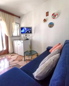TV a/nebo společenská místnost v ubytování Rumenović + 18 fotografií