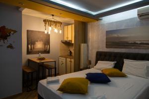 Llit o llits en una habitació de Studio Acropolis