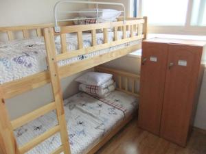 Krevet ili kreveti na kat u jedinici u objektu Gyeongju Guesthouse