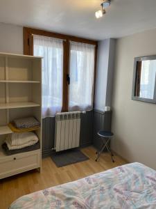 Postel nebo postele na pokoji v ubytování Cathy