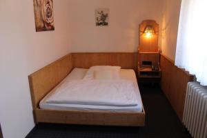 Postel nebo postele na pokoji v ubytování Hotel Höfler B&B
