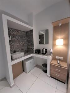 Kuchyň nebo kuchyňský kout v ubytování Elite Hotel