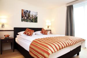 Un pat sau paturi într-o cameră la CITY STAY - Kieselgasse