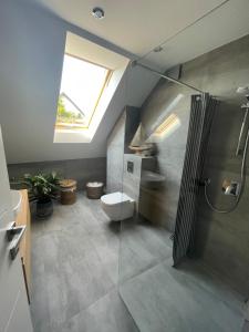 A bathroom at Apartament Biały Domek